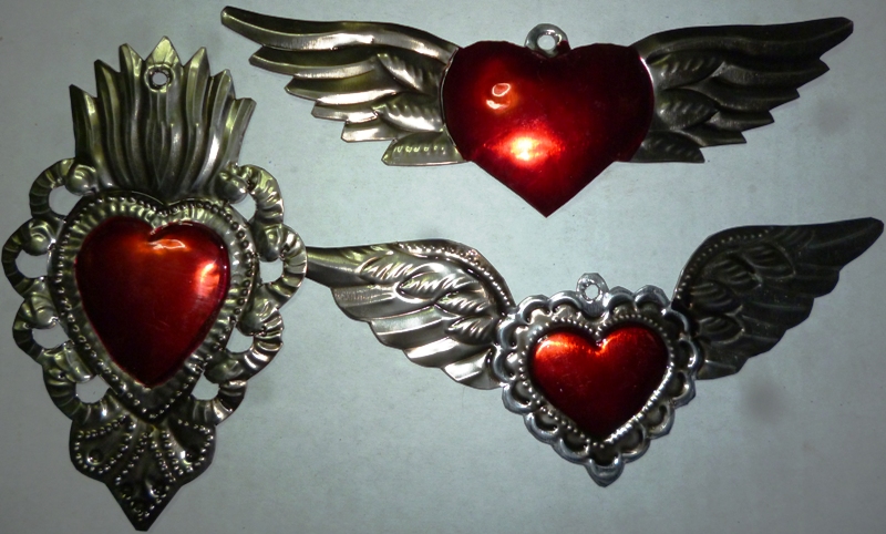 Set of three tin ornament hearts